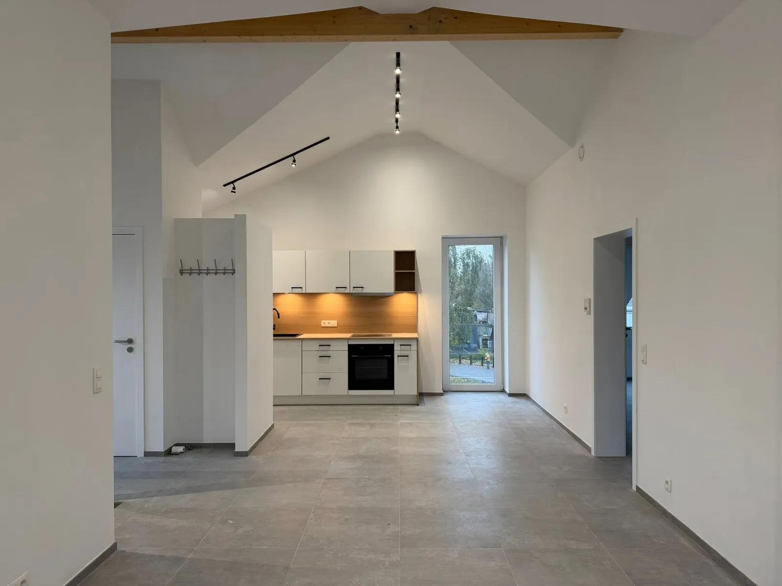 Nieuw appartement met 2 slaapkamers te huur in het centrum van Chimay